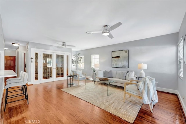 218 Covina Ave, Long Beach, CA 90803 - living room featuring french doors, ceiling fan, and wood finished floors