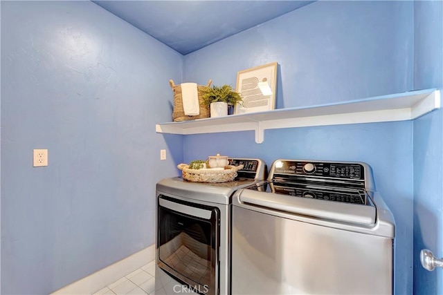 218 Covina Ave, Long Beach, CA 90803 - laundry area with washer and dryer and tile patterned flooring