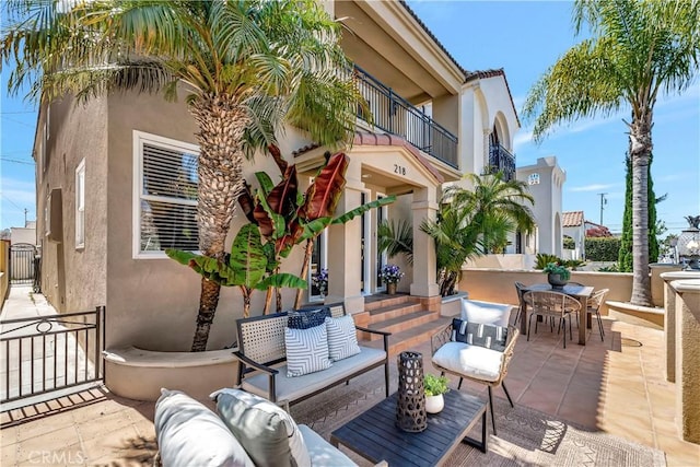 218 Covina Ave, Long Beach, CA 90803 - patio / terrace with a gate, an outdoor living space, a patio area, and outdoor dining area