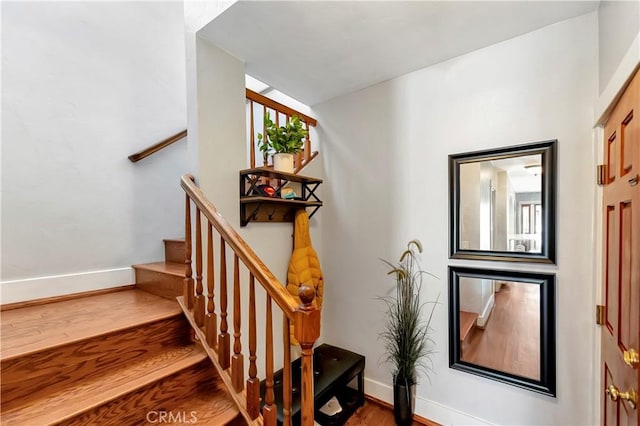 218 Covina Ave, Long Beach, CA 90803 - staircase with wood finished floors and baseboards