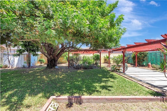 13925 Belgate St, Baldwin Park, CA 91706 - view of yard with a pergola and a shed