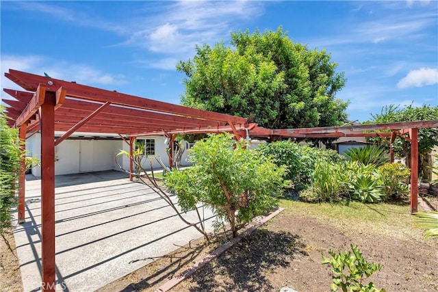 13925 Belgate St, Baldwin Park, CA 91706 - view of patio featuring a carport and a pergola