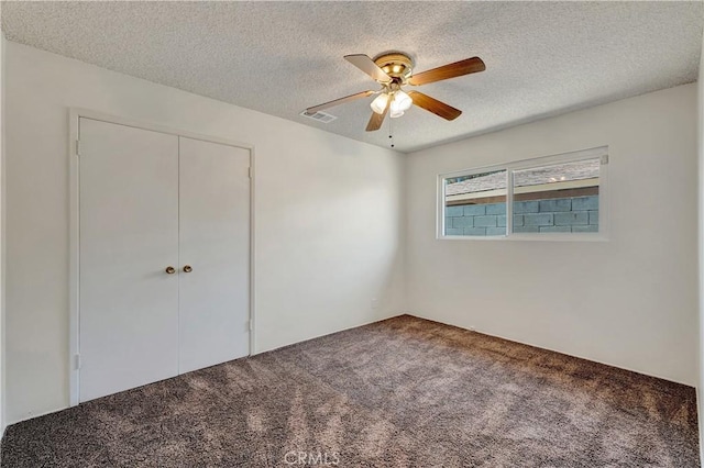 13925 Belgate St, Baldwin Park, CA 91706 - unfurnished bedroom with carpet flooring, a textured ceiling, a closet, and a ceiling fan