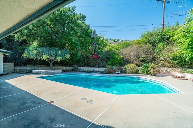 211 Peacock Ln, Montebello, CA 90640 - view of swimming pool featuring a patio and a diving board