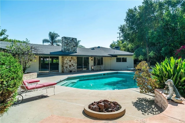 211 Peacock Ln, Montebello, CA 90640 - swimming pool featuring a patio area and a diving board