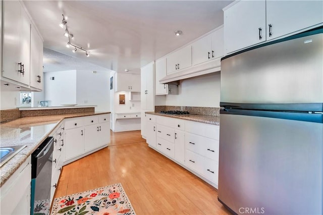 211 Peacock Ln, Montebello, CA 90640 - kitchen with appliances with stainless steel finishes, light wood-style flooring, white cabinetry, and under cabinet range hood