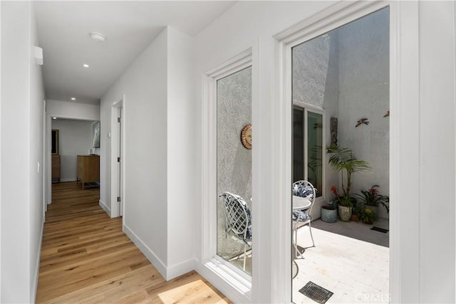 416 Via Pichon, San Clemente, CA 92672 - corridor with light wood-style floors and recessed lighting