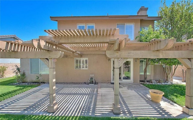 16410 Argent Rd, Chino Hills, CA 91709 - rear view of property featuring stucco siding, a patio, a pergola, and a chimney