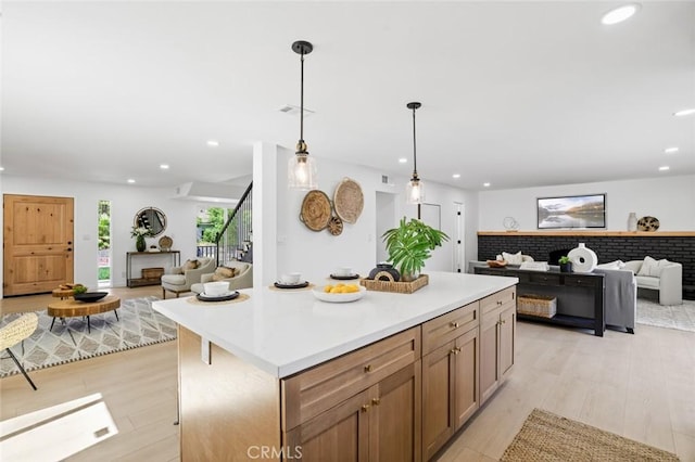 17978 Gallineta St, Rowland Heights, CA 91748 - kitchen with open floor plan, recessed lighting, a center island, light wood-style flooring, and pendant lighting