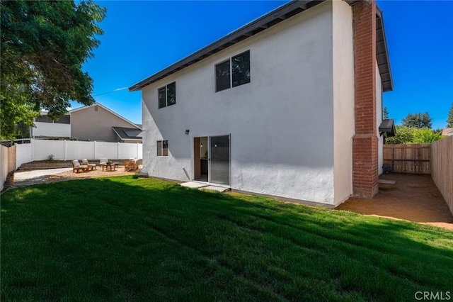 17978 Gallineta St, Rowland Heights, CA 91748 - rear view of property featuring stucco siding, a fenced backyard, and a patio area