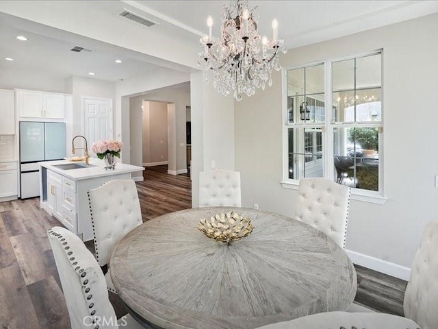 23808 Bayview Ct, Valencia, CA 91355 - dining area featuring wood finished floors, a chandelier, and recessed lighting