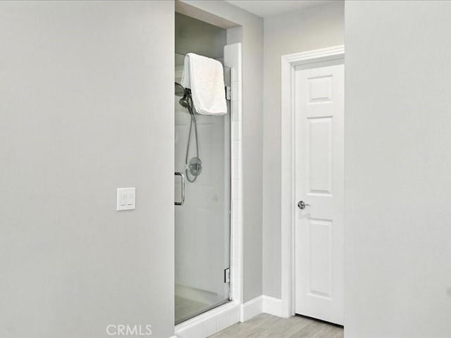 23808 Bayview Ct, Valencia, CA 91355 - full bath featuring a stall shower and wood finished floors