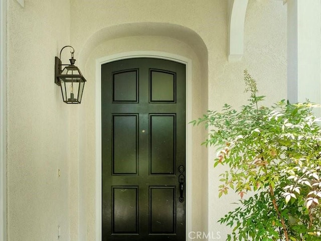 23808 Bayview Ct, Valencia, CA 91355 - view of exterior entry with stucco siding