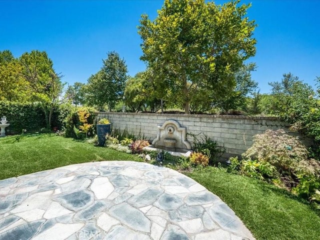 23808 Bayview Ct, Valencia, CA 91355 - fenced backyard featuring a patio area