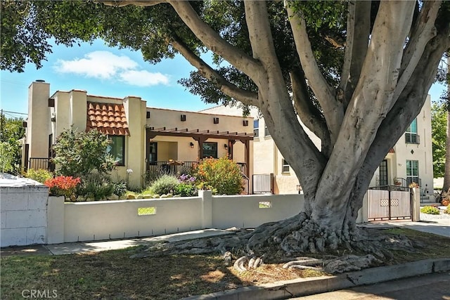 1215 S Patton Ave, San Pedro, CA 90731 - view of front facade featuring stucco siding, a chimney, and a tiled roof