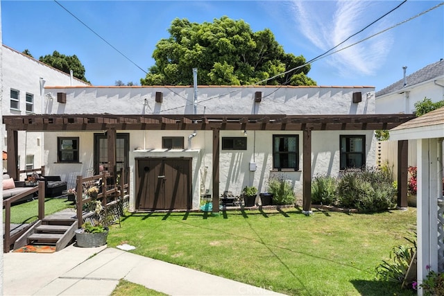 1215 S Patton Ave, San Pedro, CA 90731 - back of property with a yard and stucco siding