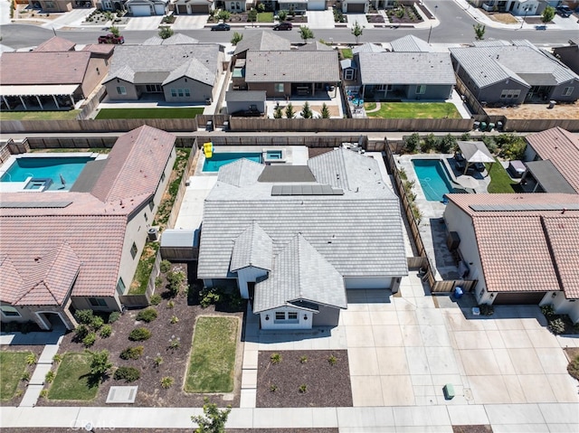 2070 Solig Ave, Kingsburg, CA 93631 - aerial perspective of suburban area featuring a pool