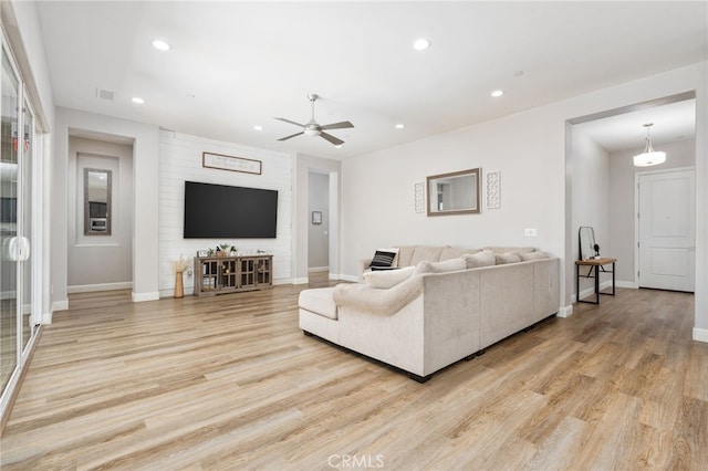 2070 Solig Ave, Kingsburg, CA 93631 - living area with recessed lighting, light wood finished floors, and a ceiling fan