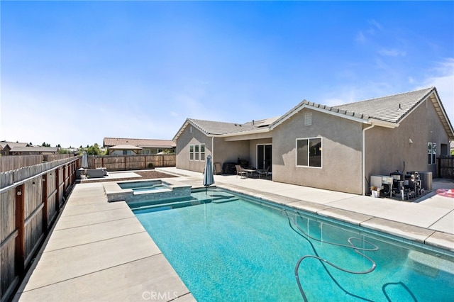 2070 Solig Ave, Kingsburg, CA 93631 - view of pool with a fenced backyard, a patio area, and a pool with connected hot tub