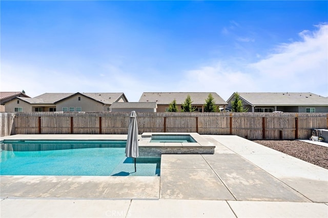 2070 Solig Ave, Kingsburg, CA 93631 - view of swimming pool with a patio, a pool with connected hot tub, a fenced backyard, and a residential view