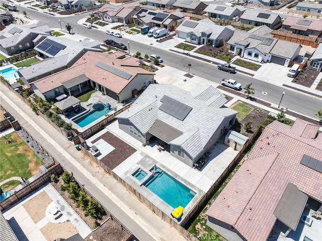2070 Solig Ave, Kingsburg, CA 93631 - aerial perspective of suburban area featuring a pool area