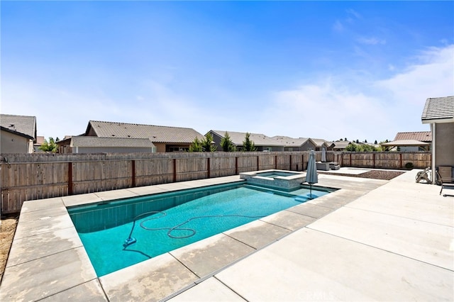 2070 Solig Ave, Kingsburg, CA 93631 - view of pool with a pool with connected hot tub, a fenced backyard, a patio area, and a residential view