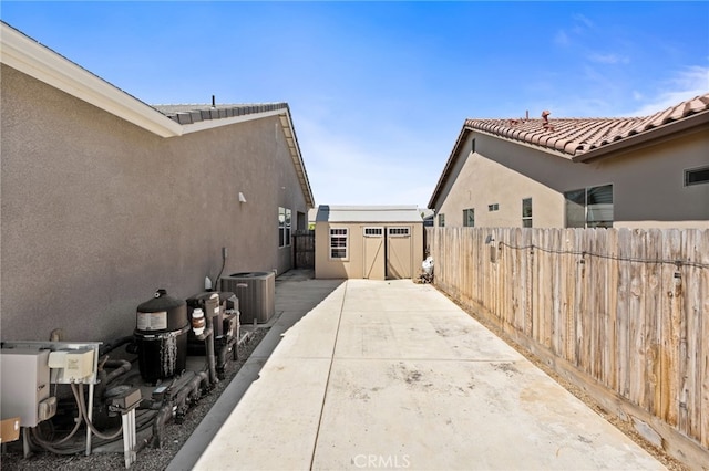 2070 Solig Ave, Kingsburg, CA 93631 - fenced backyard featuring a shed and a patio
