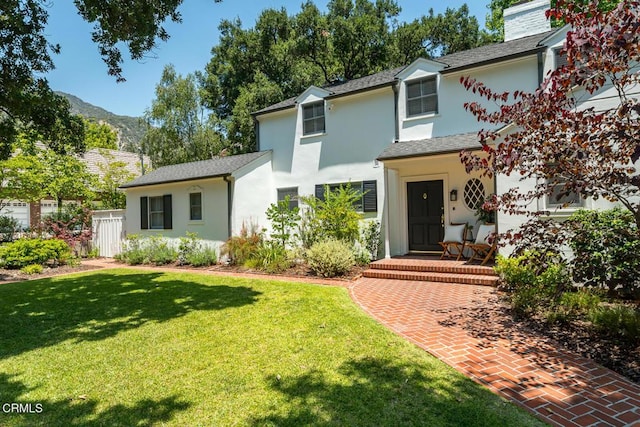 5210 La Canada Blvd, La Canada Flintridge, CA 91011 - traditional home featuring stucco siding, a mountain view, and a chimney