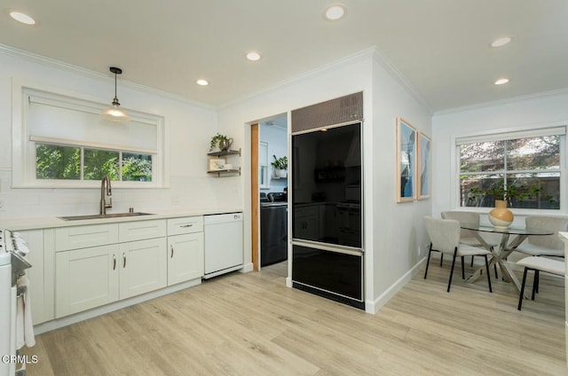 5210 La Canada Blvd, La Canada Flintridge, CA 91011 - kitchen with dishwasher, light wood finished floors, tasteful backsplash, white cabinetry, and light countertops