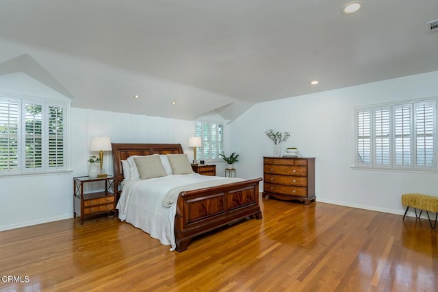 5210 La Canada Blvd, La Canada Flintridge, CA 91011 - bedroom with lofted ceiling, wood finished floors, multiple windows, and recessed lighting