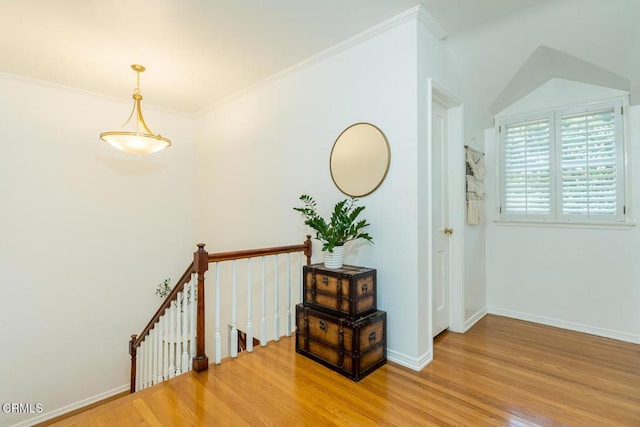 5210 La Canada Blvd, La Canada Flintridge, CA 91011 - hallway featuring an upstairs landing, light wood-style floors, and ornamental molding