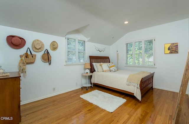 5210 La Canada Blvd, La Canada Flintridge, CA 91011 - bedroom featuring lofted ceiling, wood finished floors, multiple windows, and recessed lighting