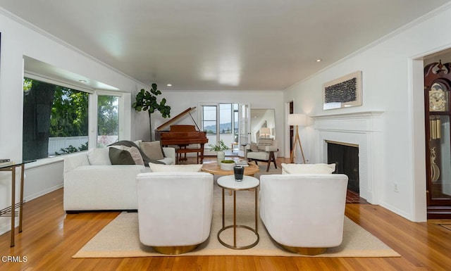 5210 La Canada Blvd, La Canada Flintridge, CA 91011 - living room with crown molding, plenty of natural light, wood finished floors, and a fireplace