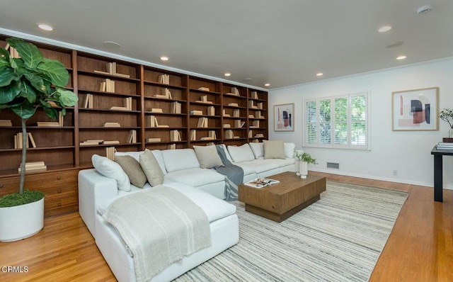 5210 La Canada Blvd, La Canada Flintridge, CA 91011 - living area featuring light wood-style flooring, recessed lighting, and ornamental molding