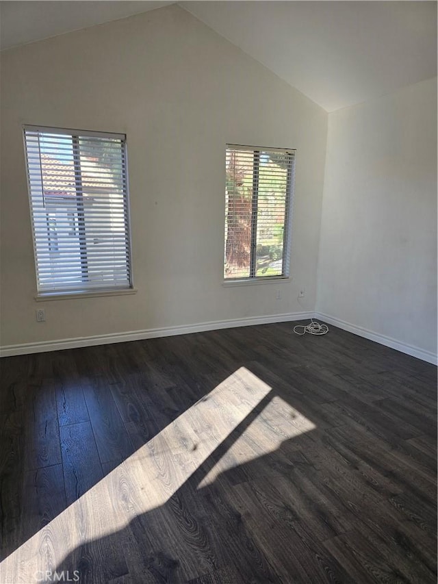 3306 Darby St Unit 404, Simi Valley, CA 93063 - spare room with vaulted ceiling and dark wood-style floors