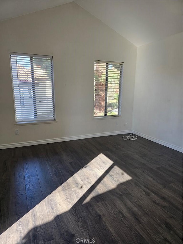 3306 Darby St Unit 404, Simi Valley, CA 93063 - spare room featuring vaulted ceiling and dark wood-type flooring