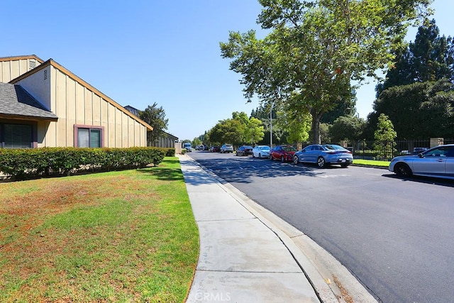 1201 W Cerritos Ave Unit 68, Anaheim, CA 92802 - view of asphalt street with sidewalks and curbs