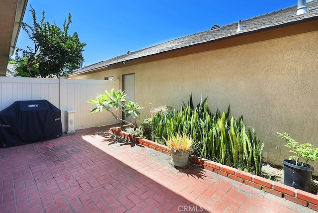 1201 W Cerritos Ave Unit 68, Anaheim, CA 92802 - view of patio featuring grilling area