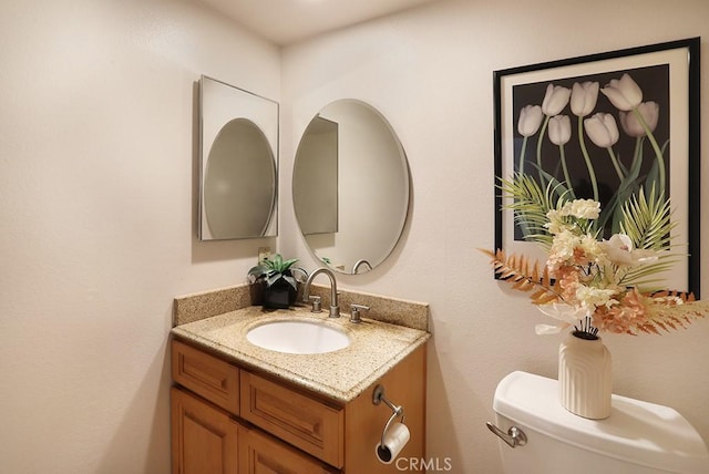 1201 W Cerritos Ave Unit 68, Anaheim, CA 92802 - bathroom featuring vanity and toilet