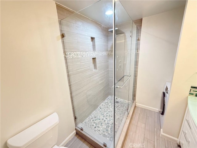 1126 N Central Ave Unit 303, Glendale, CA 91202 - bathroom with a stall shower, vanity, and washer / clothes dryer