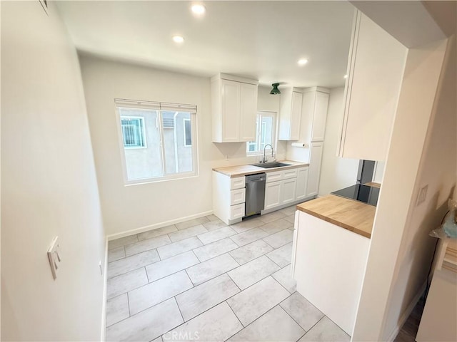 1126 N Central Ave Unit 303, Glendale, CA 91202 - kitchen featuring dishwasher, white cabinets, recessed lighting, wooden counters, and light tile patterned floors