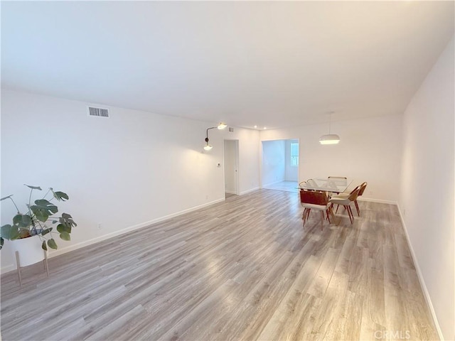 1126 N Central Ave Unit 303, Glendale, CA 91202 - spare room featuring light wood-type flooring and baseboards