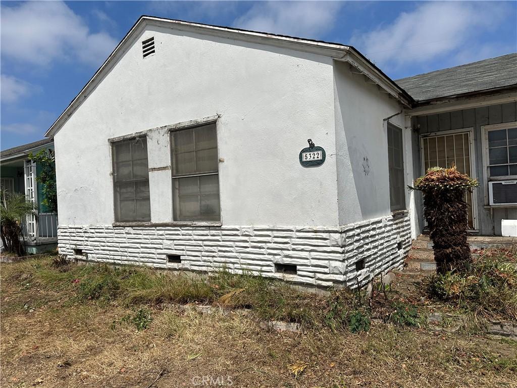 5322 Pearce Ave, Lakewood, CA 90712 - view of property exterior with cooling unit and stucco siding