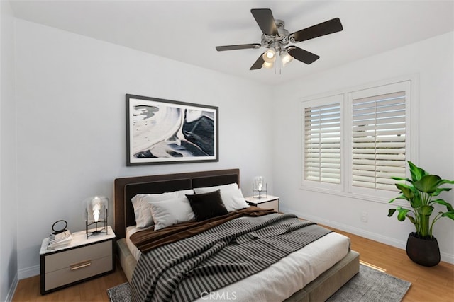 17695 Brittany Ln Unit 74, Huntington Beach, CA 92647 - bedroom featuring wood finished floors and ceiling fan