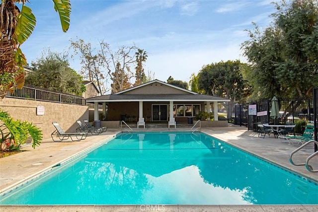 17695 Brittany Ln Unit 74, Huntington Beach, CA 92647 - community pool with a patio area
