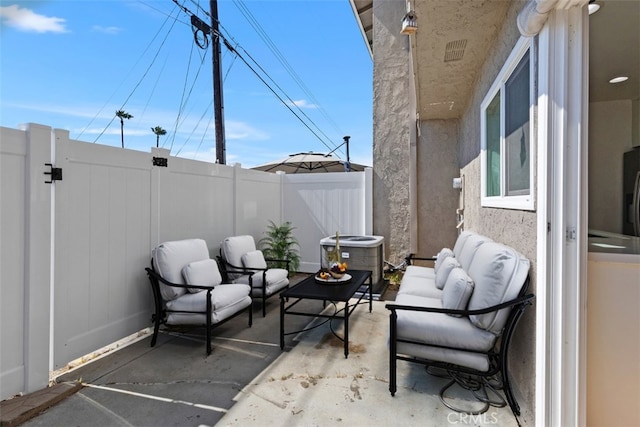 17695 Brittany Ln Unit 74, Huntington Beach, CA 92647 - fenced backyard with a patio area, a gate, and an outdoor living space
