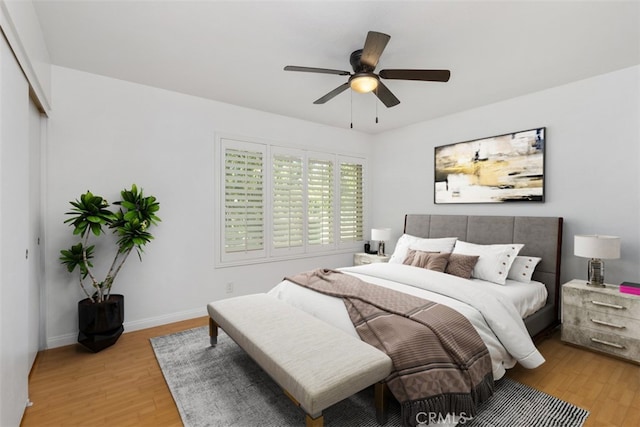 17695 Brittany Ln Unit 74, Huntington Beach, CA 92647 - bedroom featuring light wood-style floors, a ceiling fan, and a closet