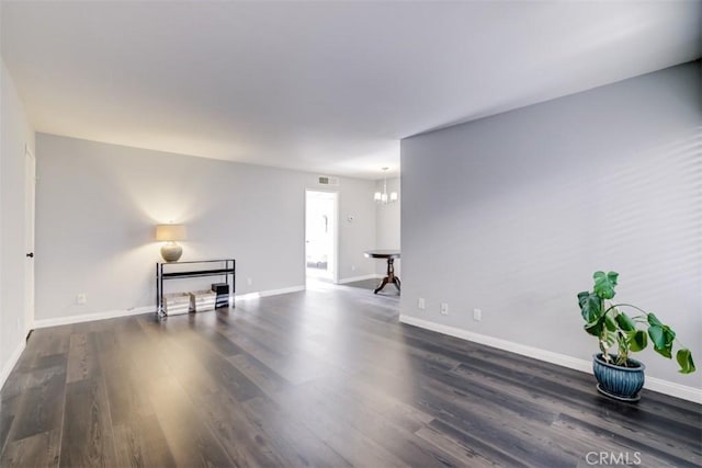 9920 Jordan Ave Unit 7, Chatsworth, CA 91311 - spare room with a chandelier and wood finished floors