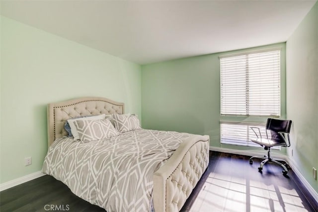 9920 Jordan Ave Unit 7, Chatsworth, CA 91311 - bedroom featuring baseboards and wood finished floors