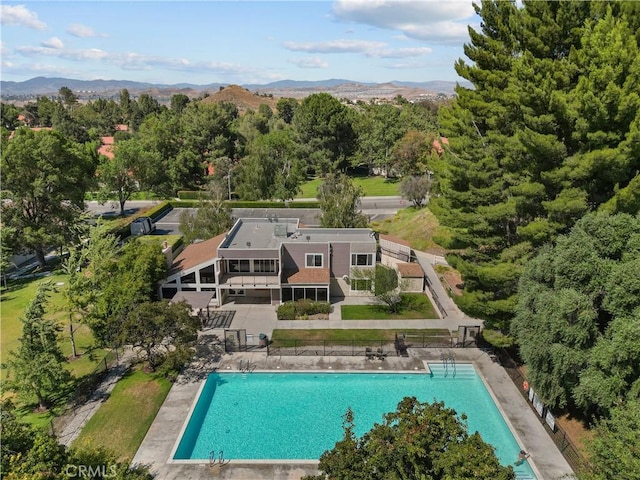 26337 Rainbow Glen Dr Unit 244, Newhall, CA 91321 - view from above of property with a pool and a mountainous background